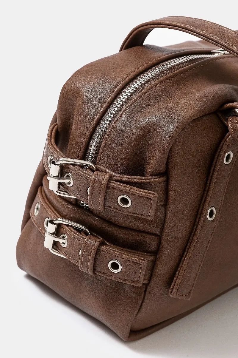 Multi Grommet Belt Strap Rustic Rectangular Hand Bag in Taupe