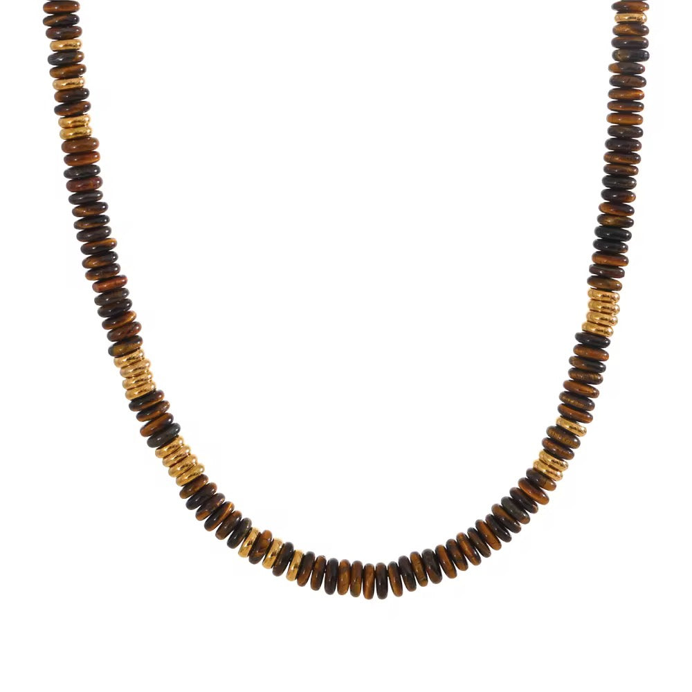 Necklace with brown and gold beads on a white background