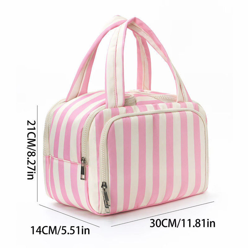 Pink and white striped bag with dimensions on a white background