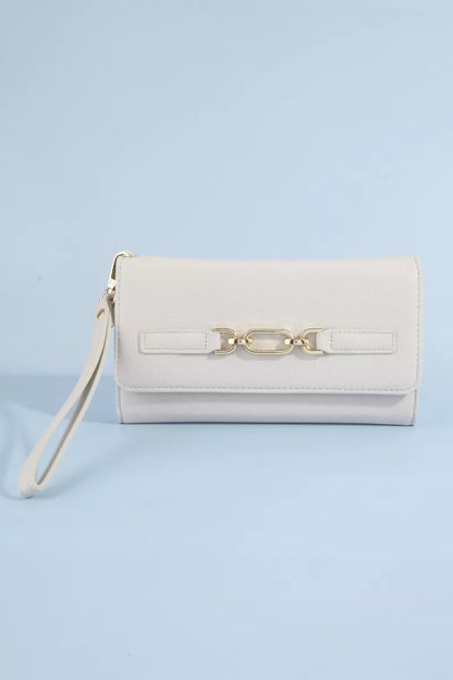 wristlet wallet with gold accents