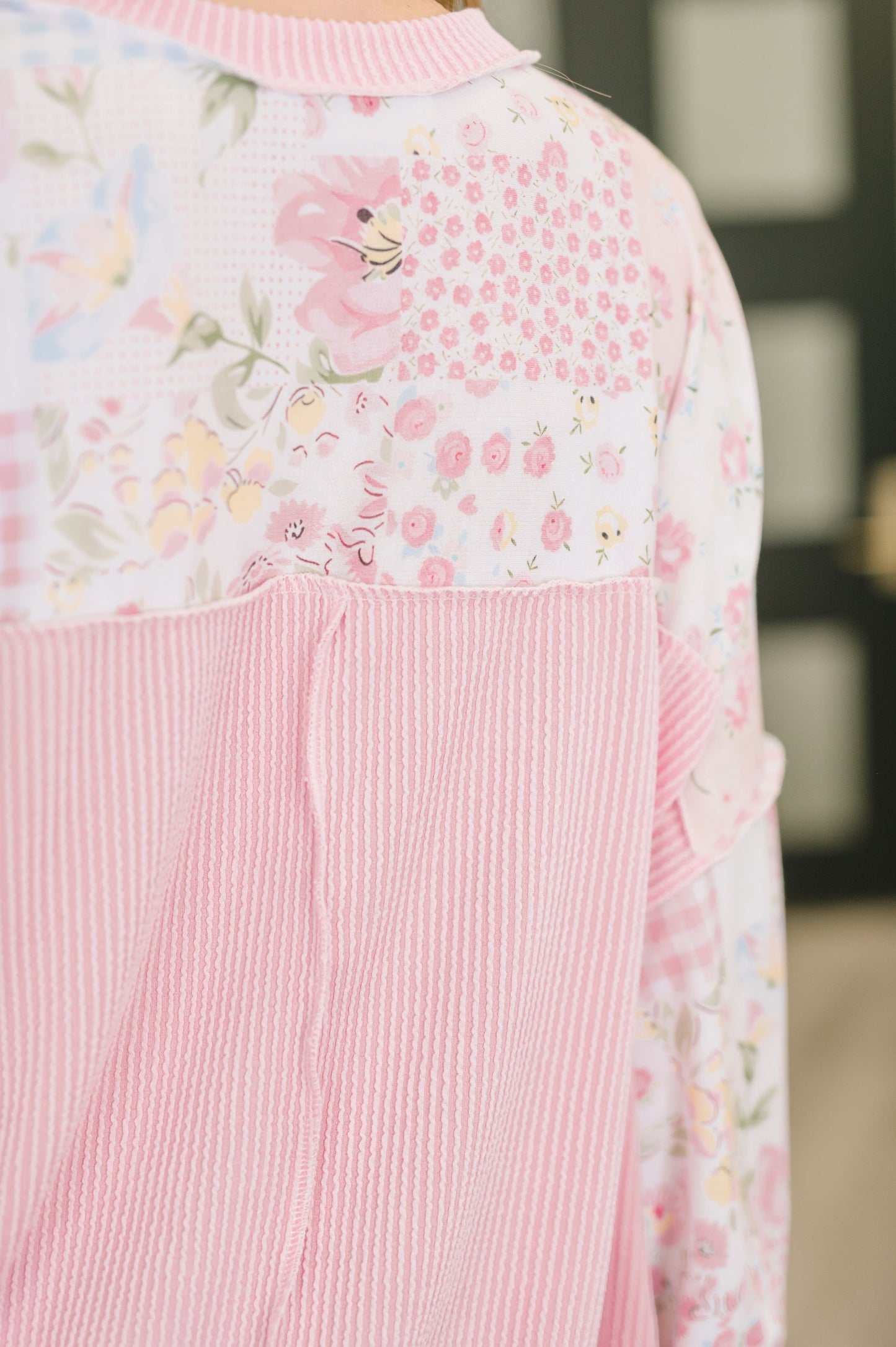 Pink floral dress with a blurred background