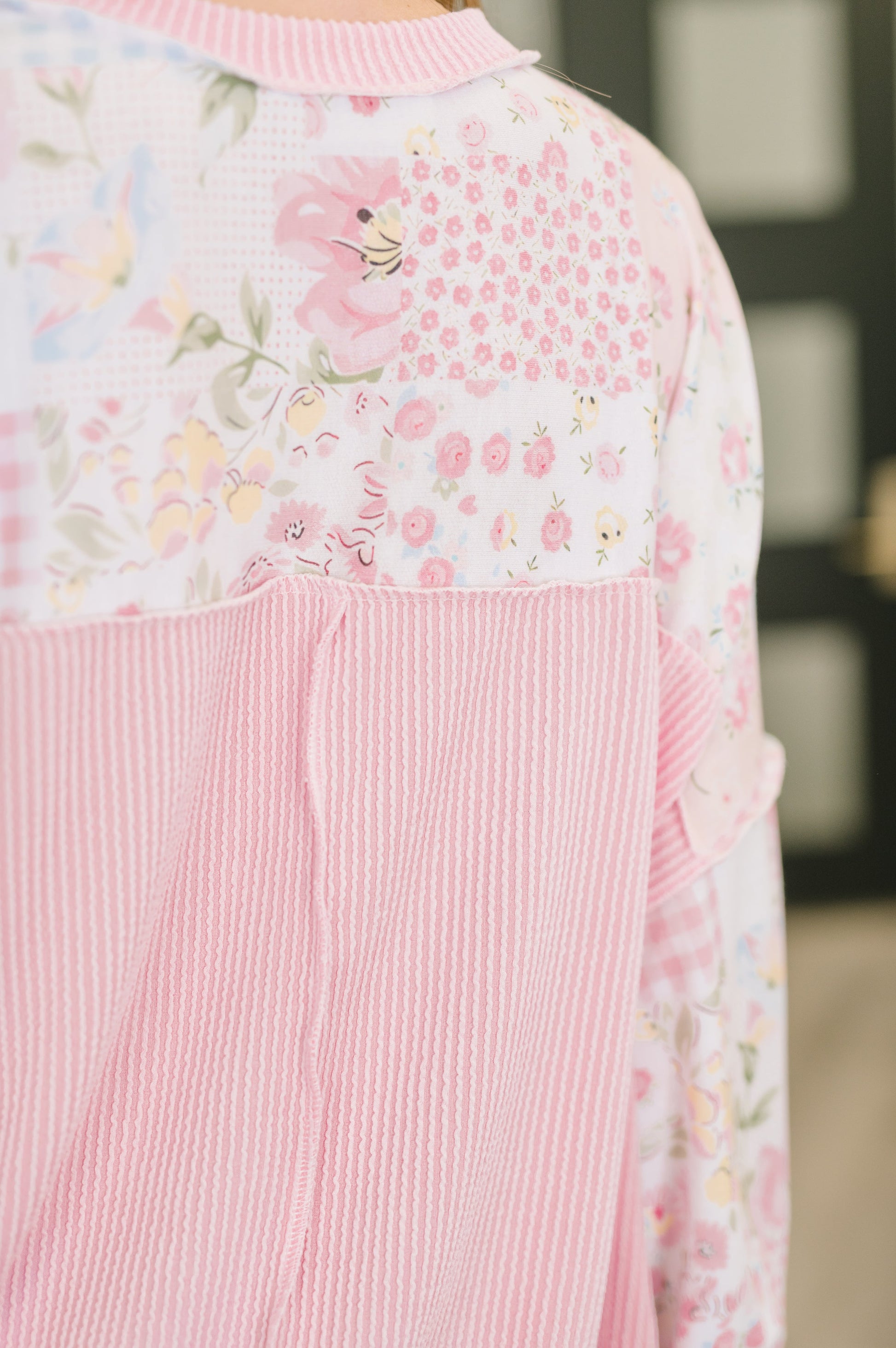 Pink floral dress with a blurred background