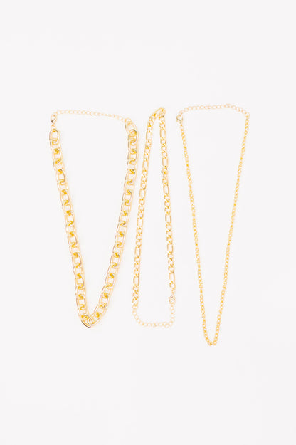 Two gold chain necklaces on a white background