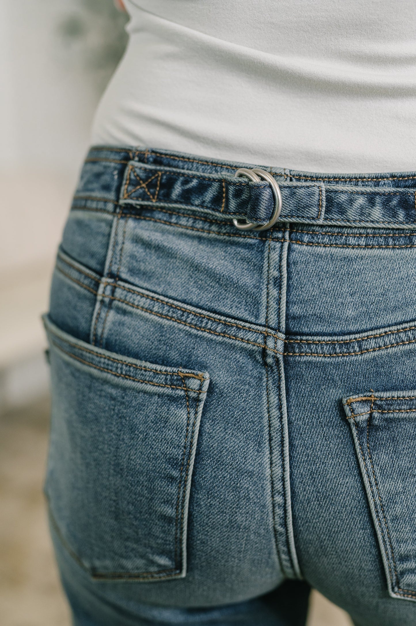 Close-up of blue jeans with a blurred background