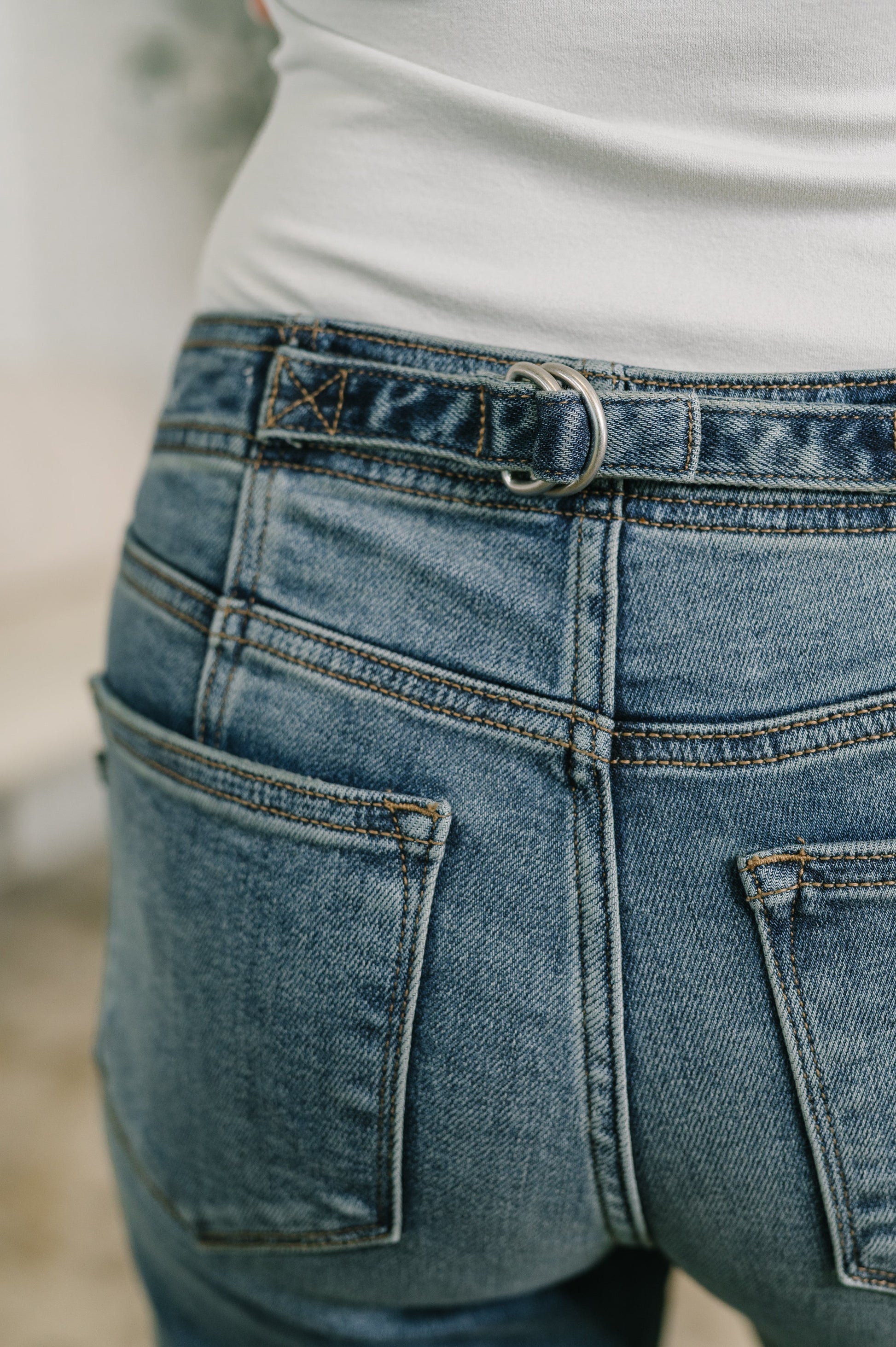 Close-up of blue jeans with a blurred background
