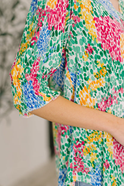 Colorful patterned dress with a blurred background