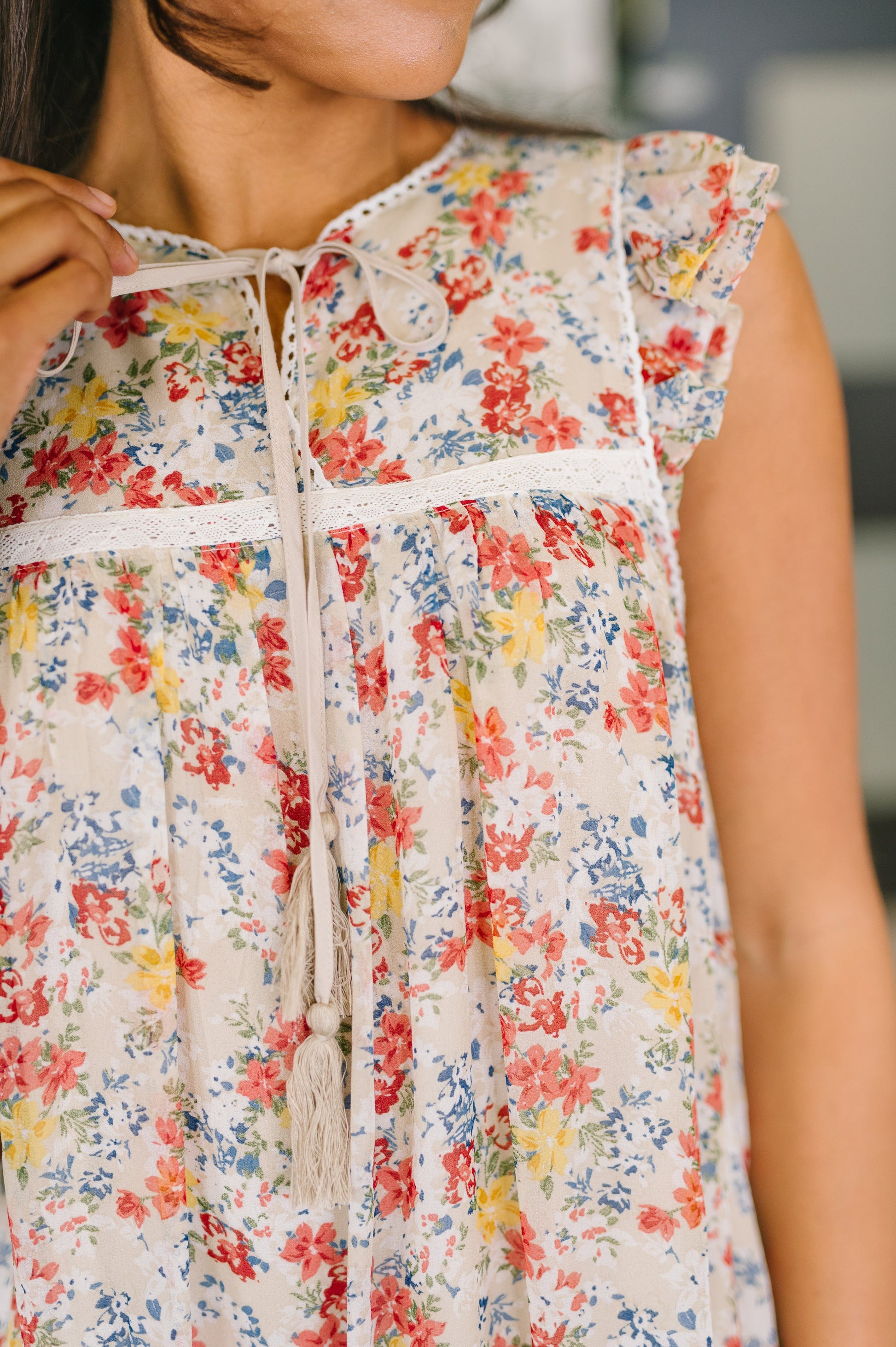 Close-up of a floral dress with a blurred background