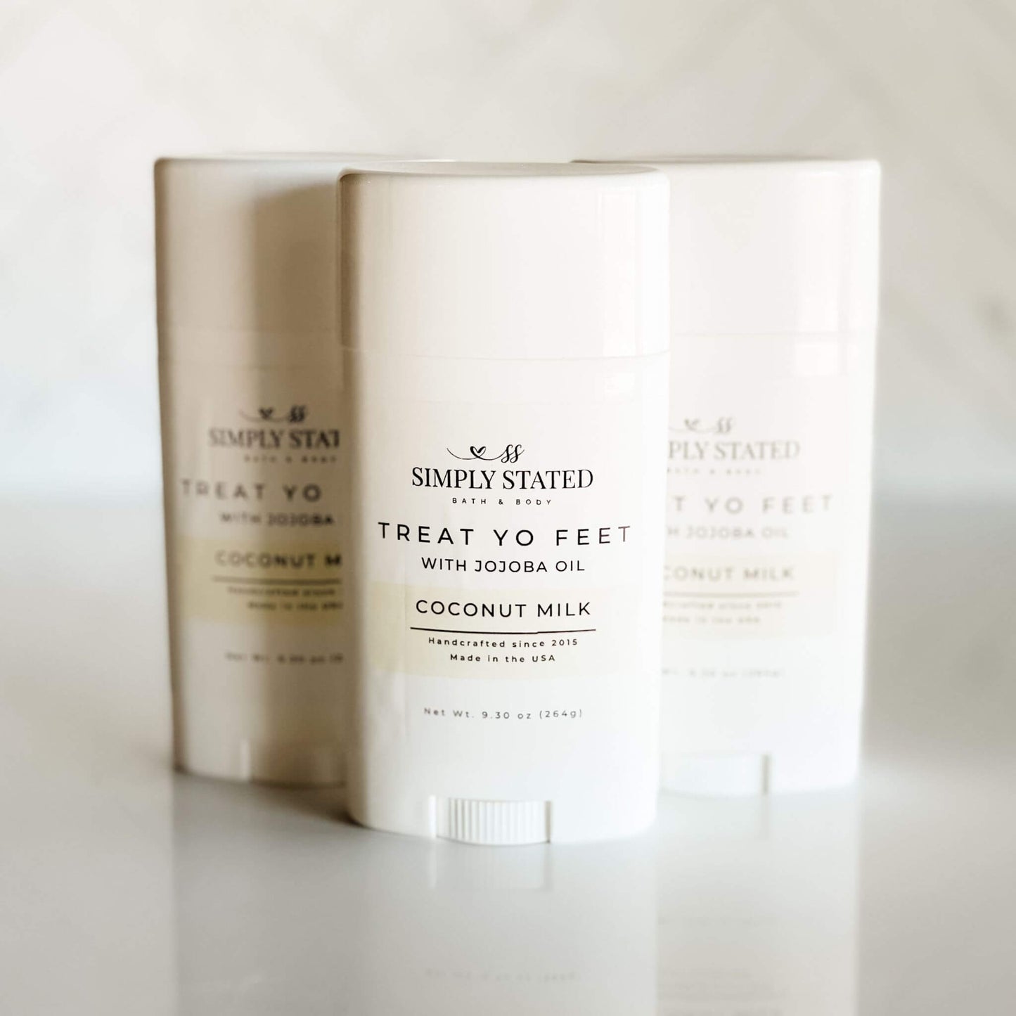 Two bars of soap with labels on a white background