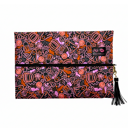 Halloween-themed pouch with pumpkins, ghosts, and other decorations on a white background.