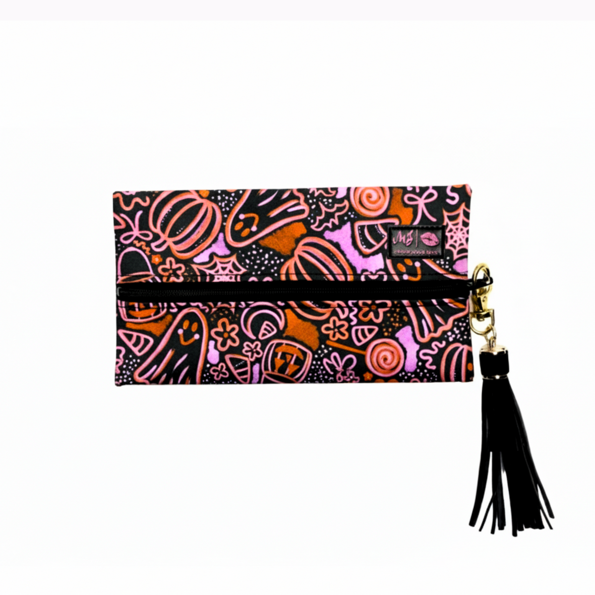 Colorful patterned clutch with a tassel on a white background