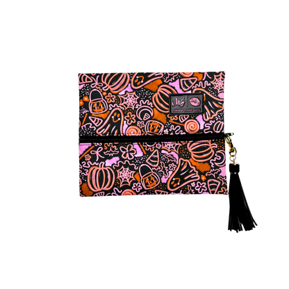Halloween-themed pouch with tassel on a white background