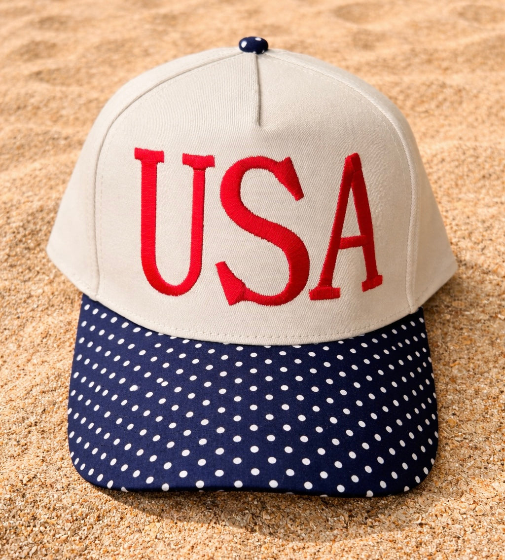 Cap with 'USA' on a beige background