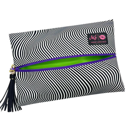 Makeup bag with black and white striped pattern, green interior, and purple zipper on a white background.