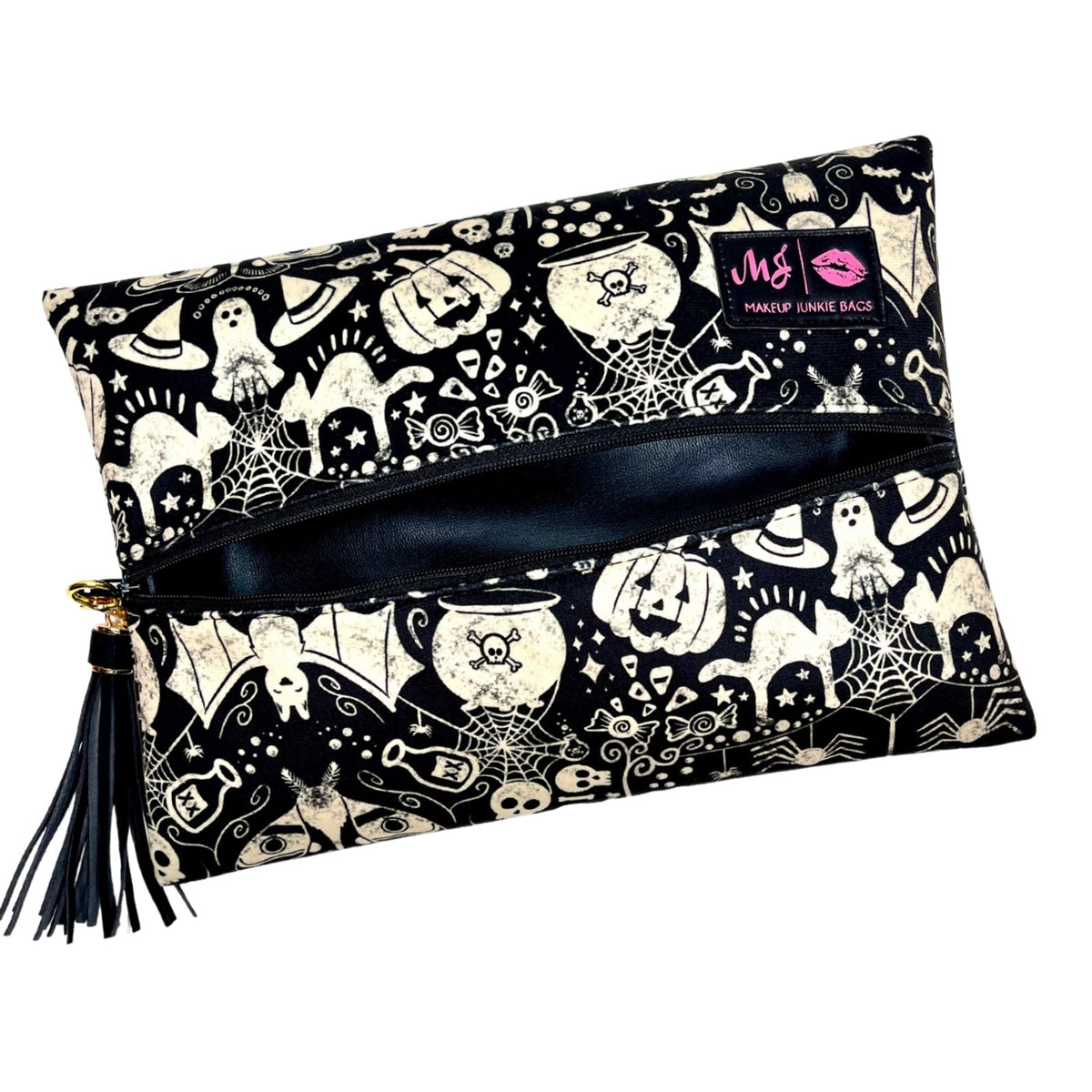 Halloween-themed makeup bag with ghost, pumpkin, and witch design on a white background