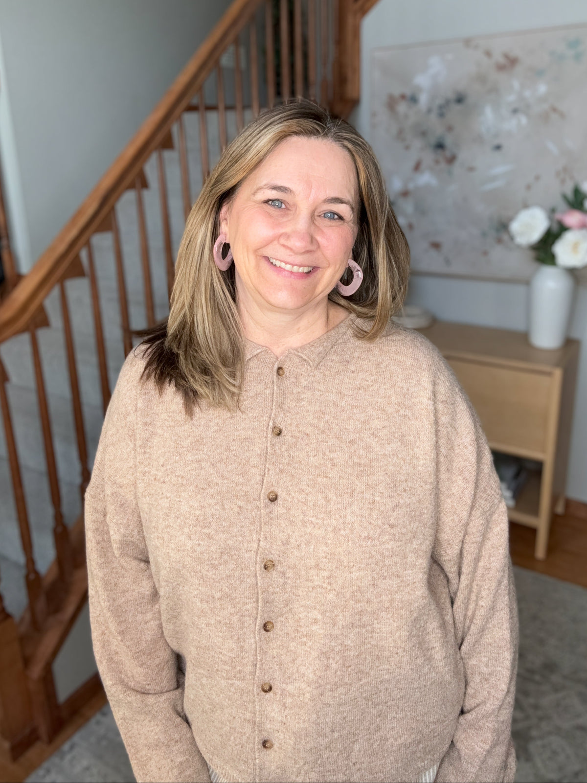 women wearing button up neutral brow long sleeve cardigan