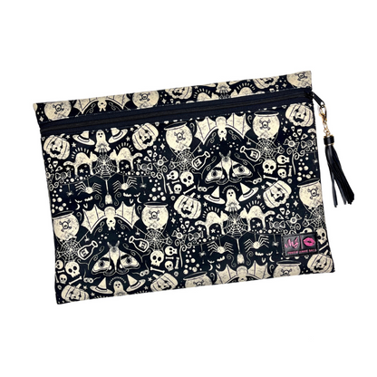 Pouch with Halloween-themed design featuring ghosts, pumpkins, and bats on a black background.